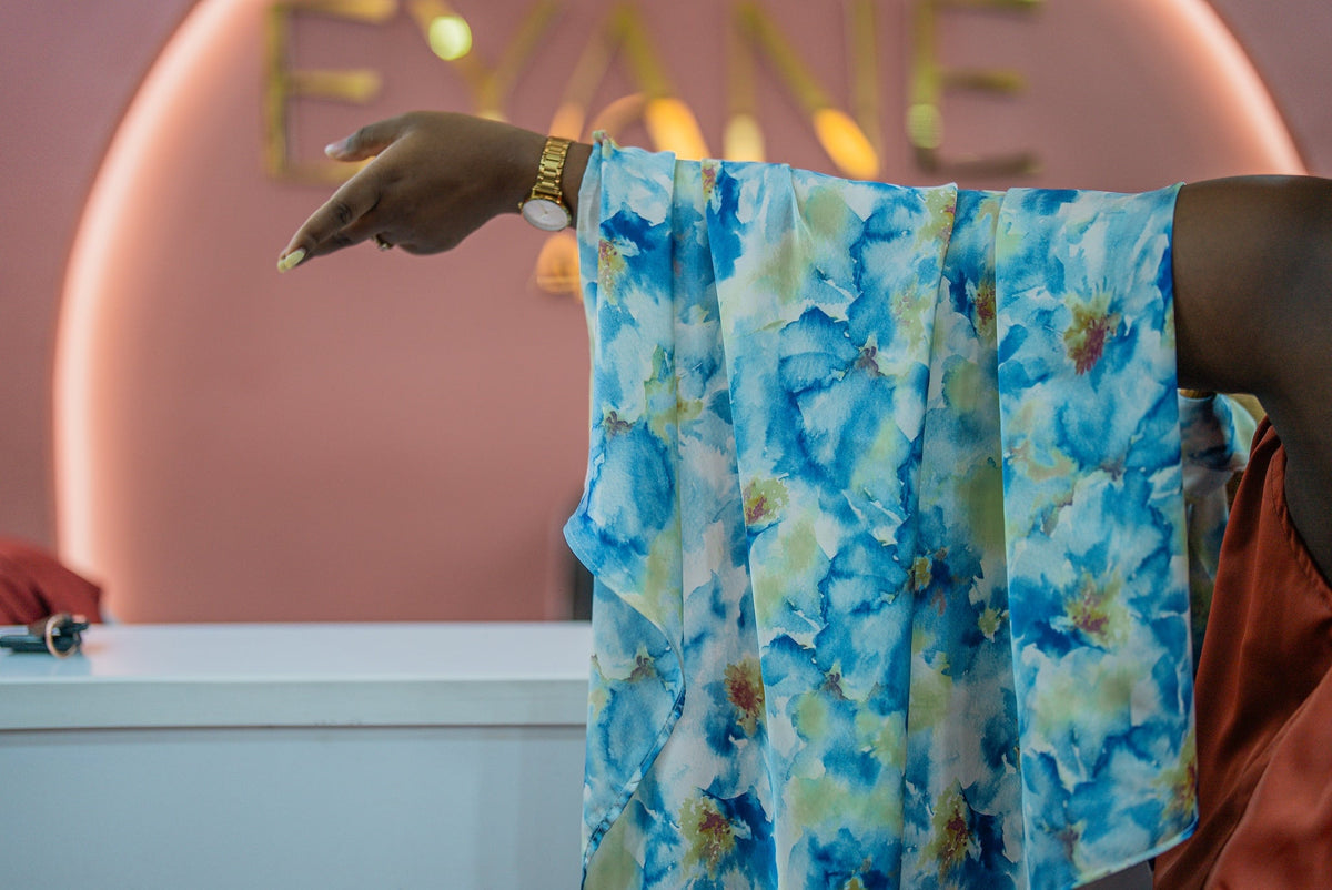 Lana scarf draped over an arm