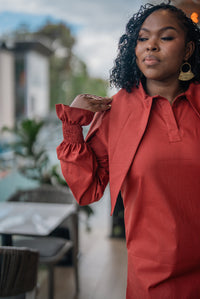 Close-up of the collar on the terracotta CHETU shirt dress