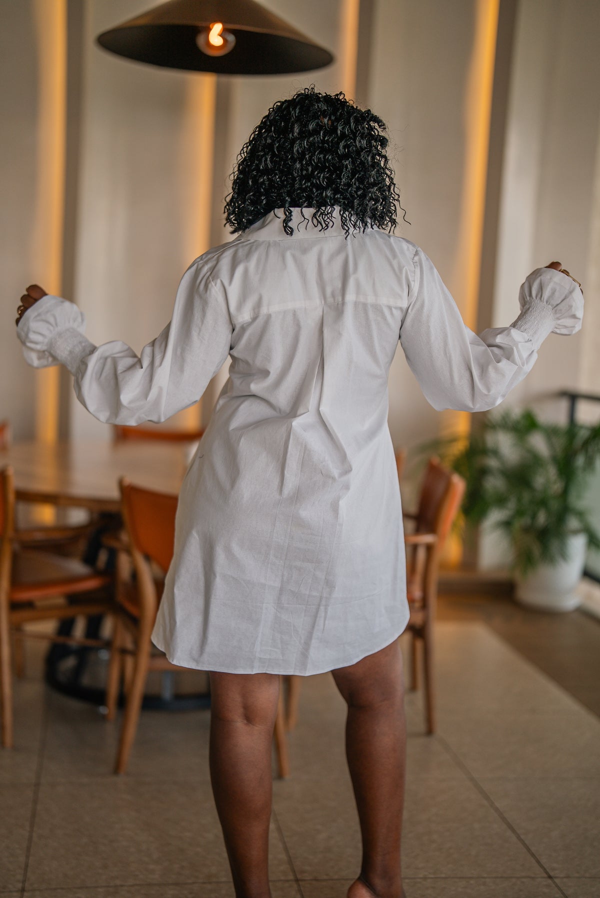 Back view of the white CHETU shirt dress