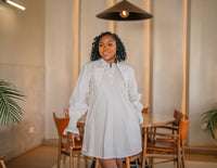 Waist-up view of the white CHETU shirt dress