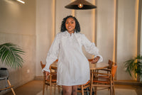 Waist-up view of the white CHETU shirt dress