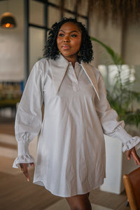 Waist-up view of the white CHETU shirt dress