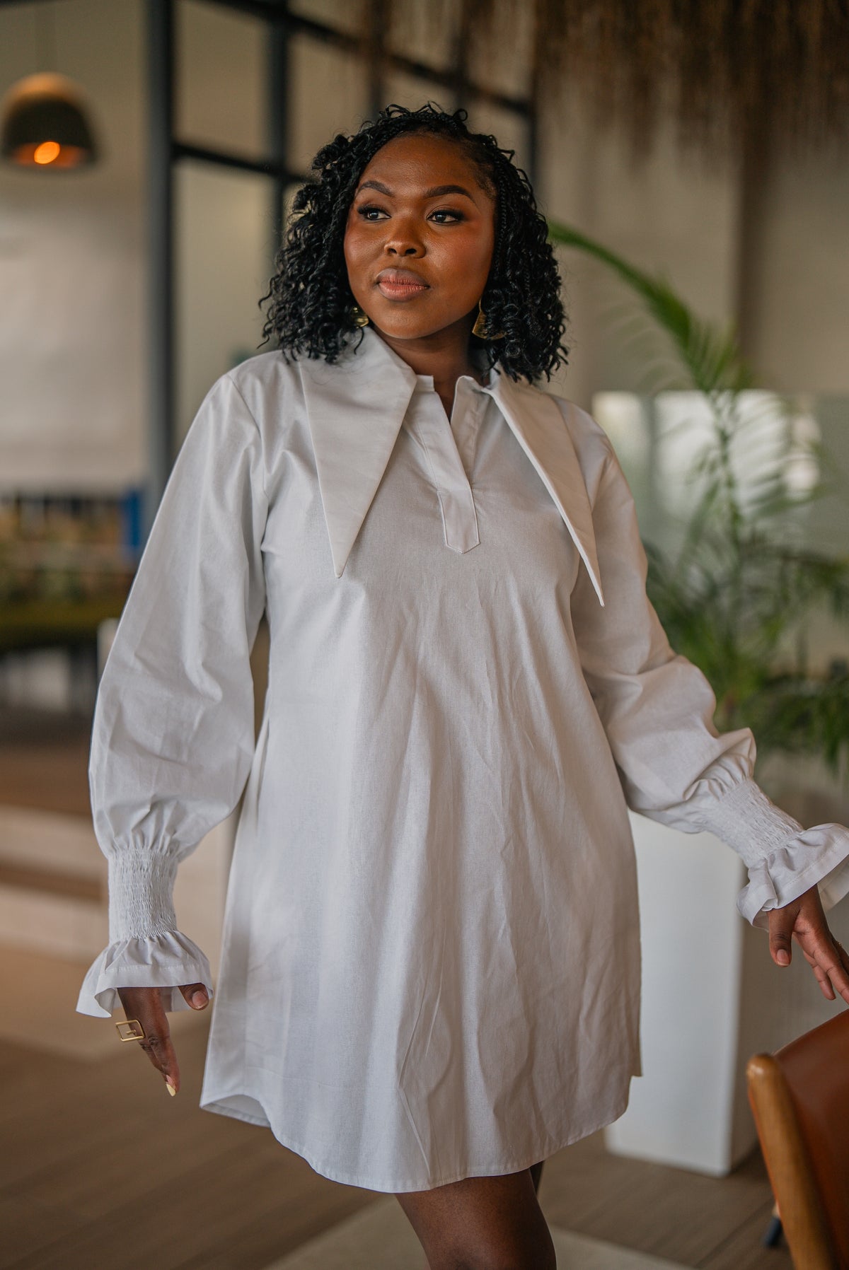 Waist-up view of the white CHETU shirt dress