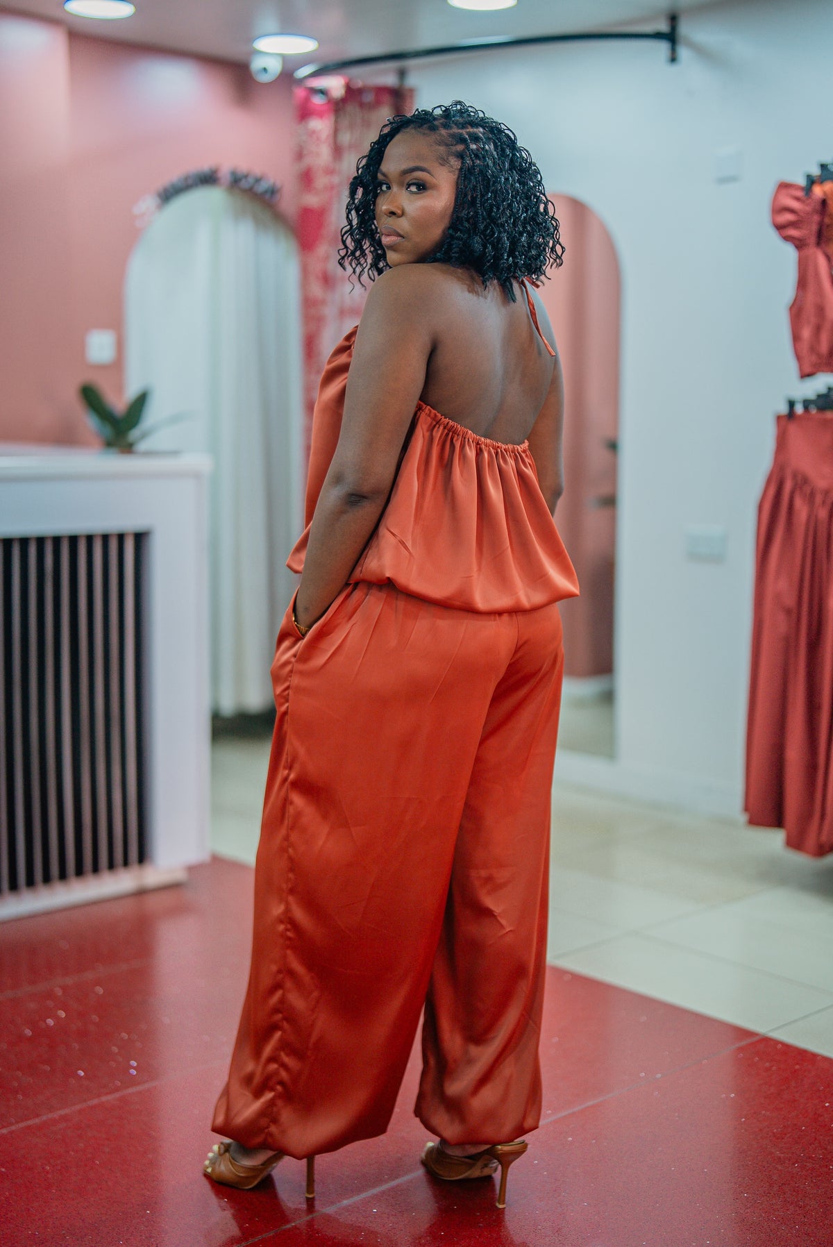 Back view of the terracotta Maputo top and pants set