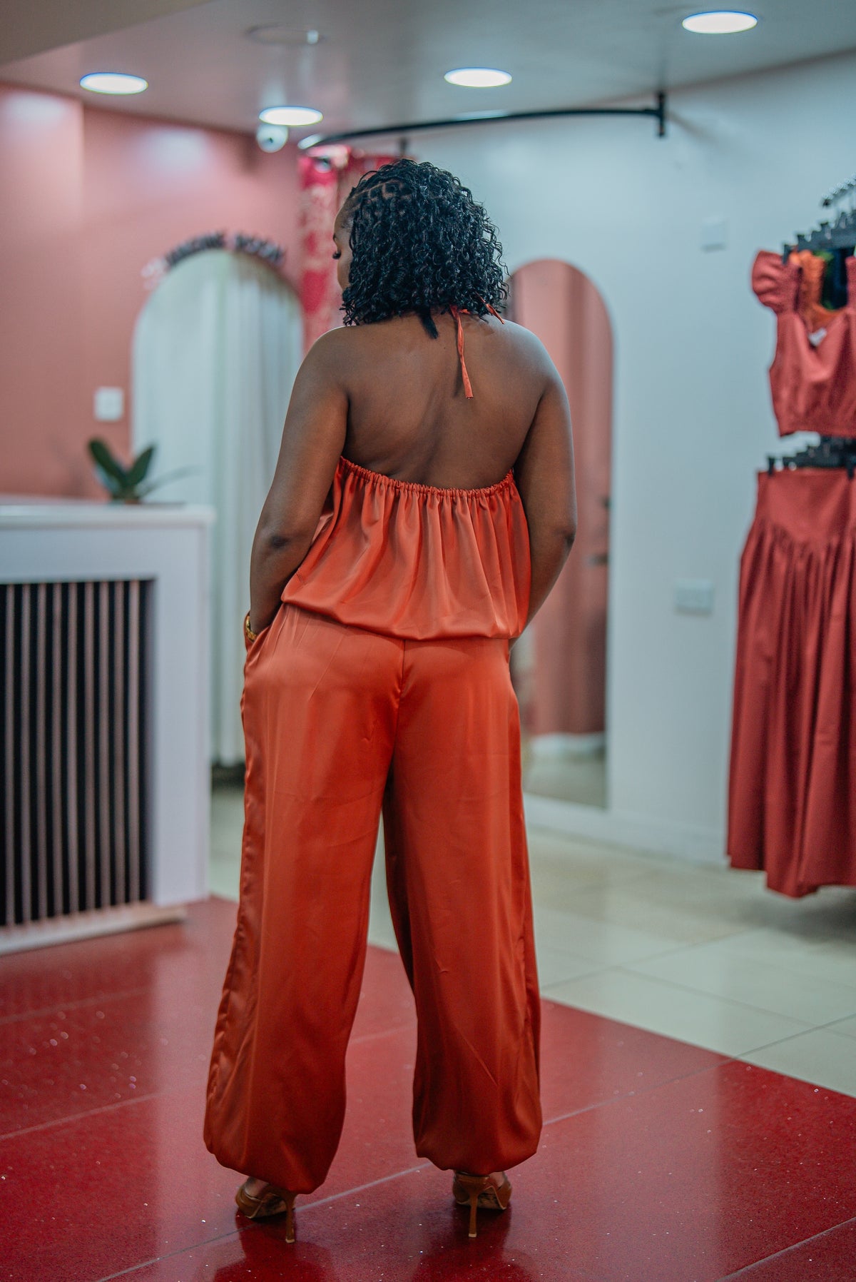 Back view of the terracotta Maputo top and pants set
