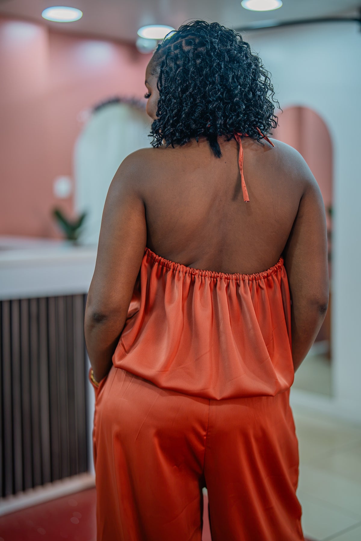 Back view of the terracotta Maputo top and pants set