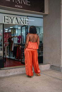 Terracotta Maputo top and pants set, full-length back view outside Eyane Africa Westlands store
