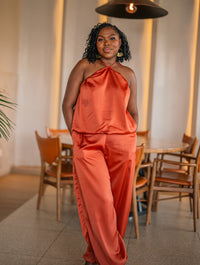 Terracotta Maputo top and pants set, full-length front view at a restaurant