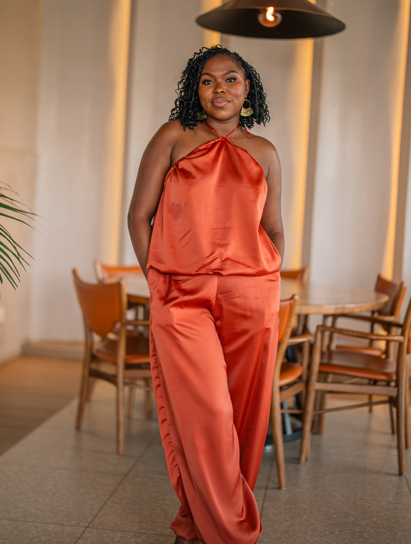 Terracotta Maputo top and pants set, full-length front view at a restaurant