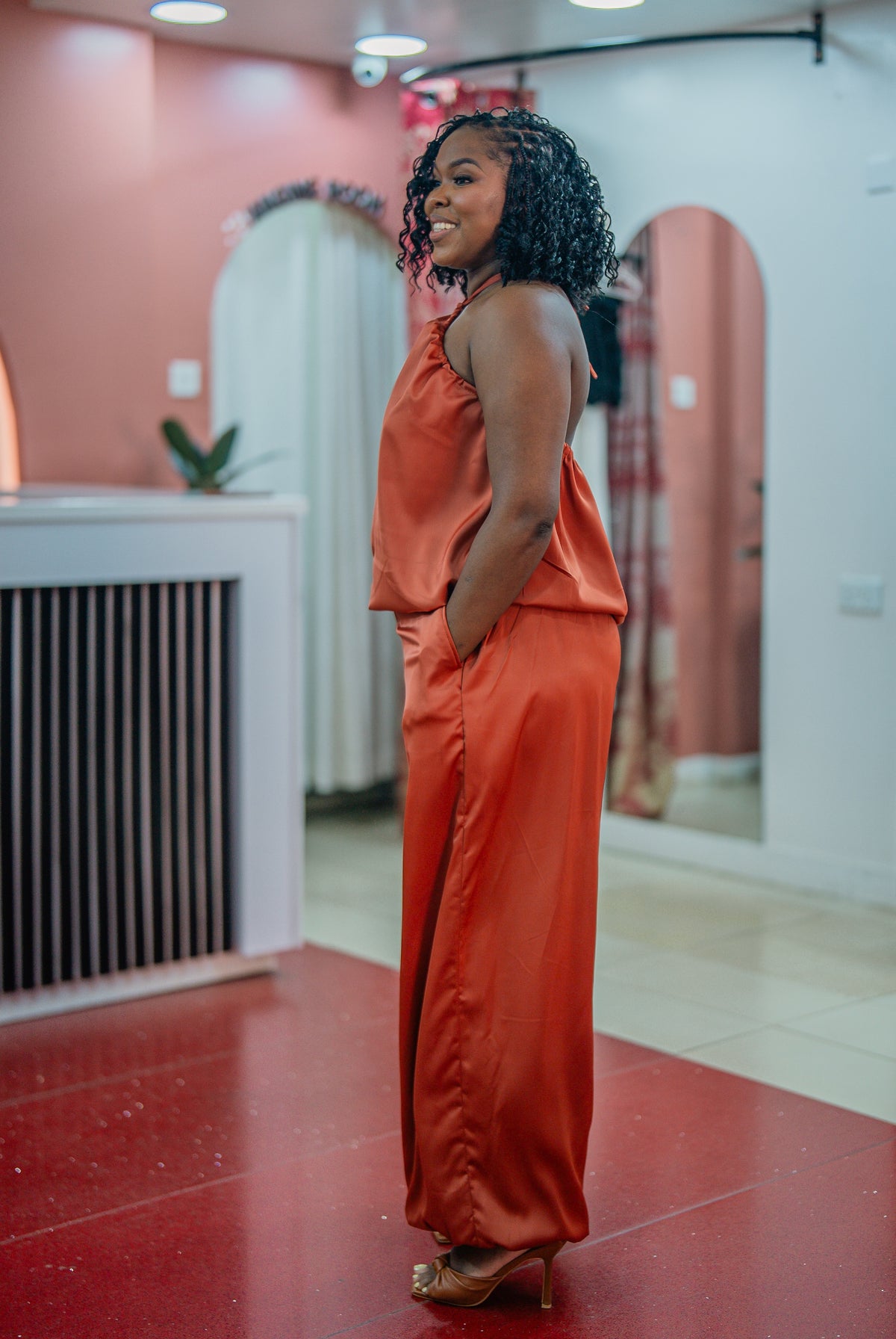 Side view of the terracotta Maputo top and pants set