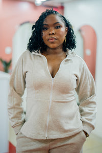 Close-up of the light heather gray Msimu jacket