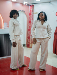 Light heather gray Msimu jacket and pants set worn together