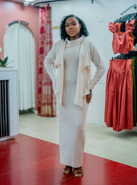 Beige Msimu knit waterfall sweater top worn over the Msimu maxi dress, front view