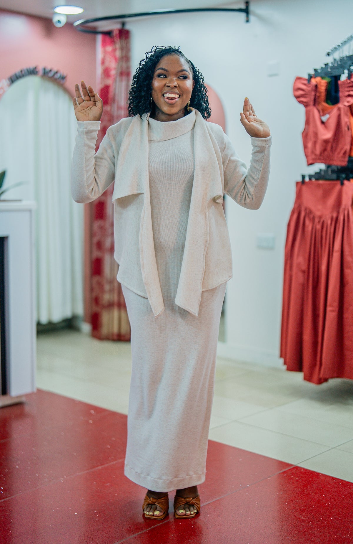 Beige Msimu knit waterfall sweater top worn over the Msimu maxi dress, front view