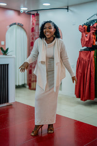 Beige Msimu knit waterfall sweater top worn over the Msimu maxi dress, front view