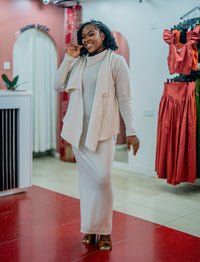 Beige Msimu knit waterfall sweater top worn over the Msimu maxi dress, front view