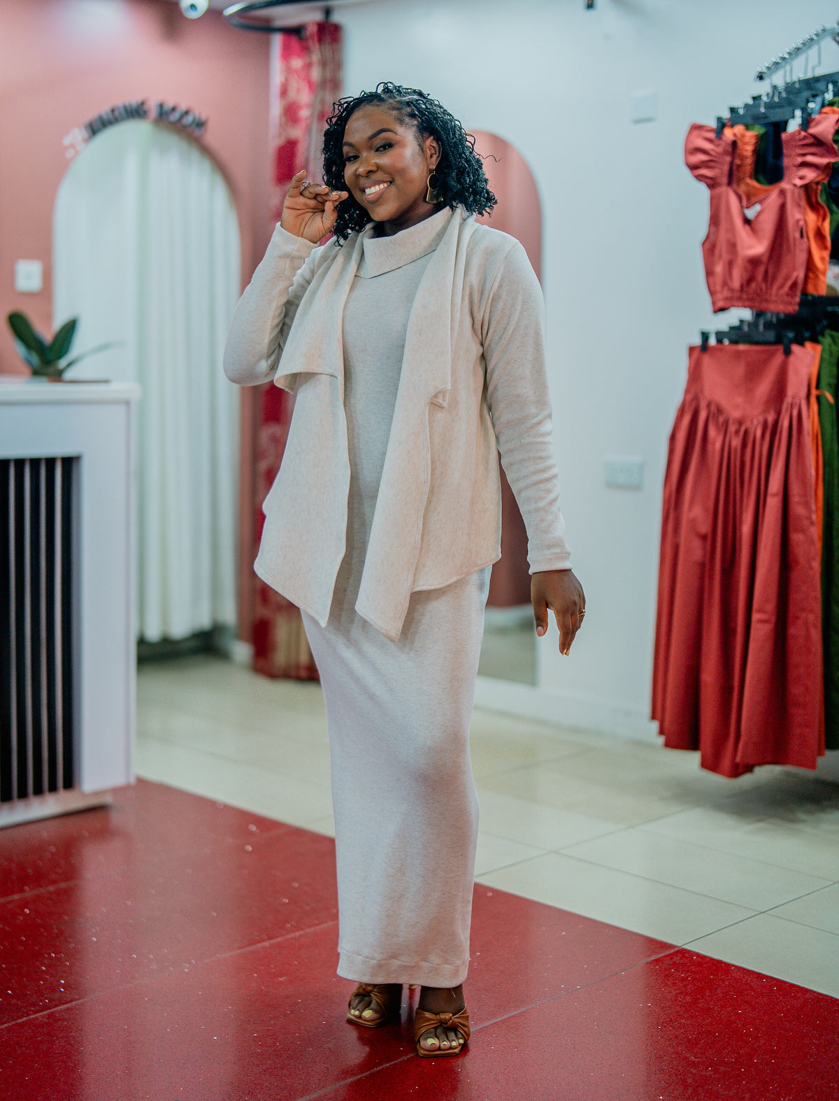 Beige Msimu knit waterfall sweater top worn over the Msimu maxi dress, front view