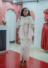 Beige Msimu knit waterfall sweater top worn over the Msimu maxi dress, front view