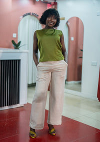 Light heather gray Msimu pants styled with the olive green Tia top