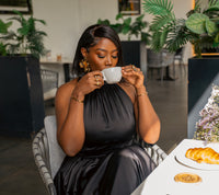 Black Tia maxi dress at a coffee shop