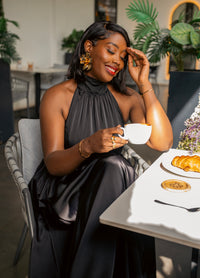Black Tia maxi dress at a coffee shop