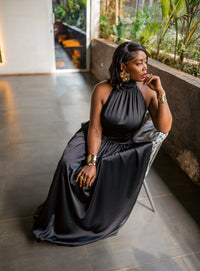 Black Tia maxi dress, seated, front view