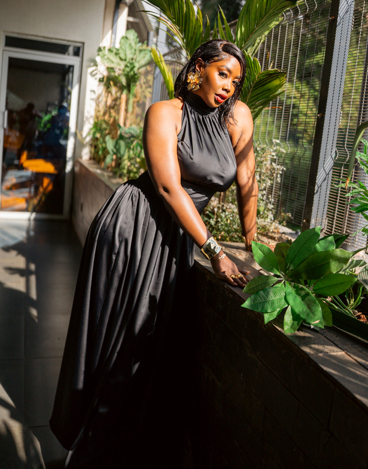 Black silky Tia maxi dress, full-length front view, standing