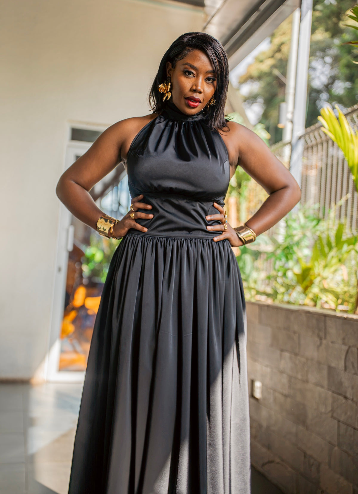Black silky Tia maxi dress, full-length front view, standing